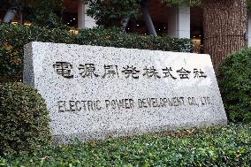 Power Development signboard and logo